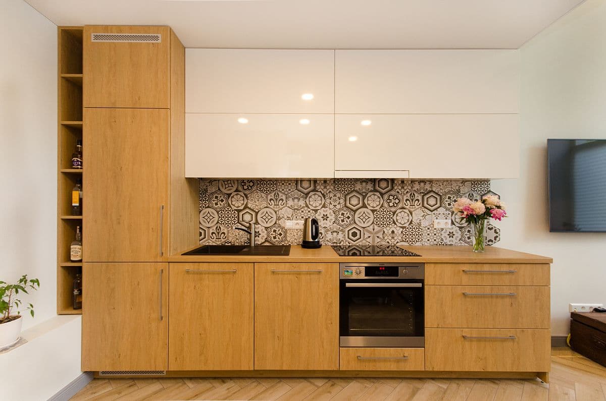 Modern modular kitchen cabinetry and storage in a Navi Mumbai home