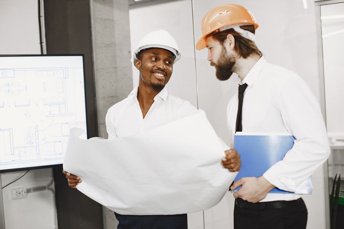 Contractor and designer reviewing plans together for a Navi Mumbai home renovation
